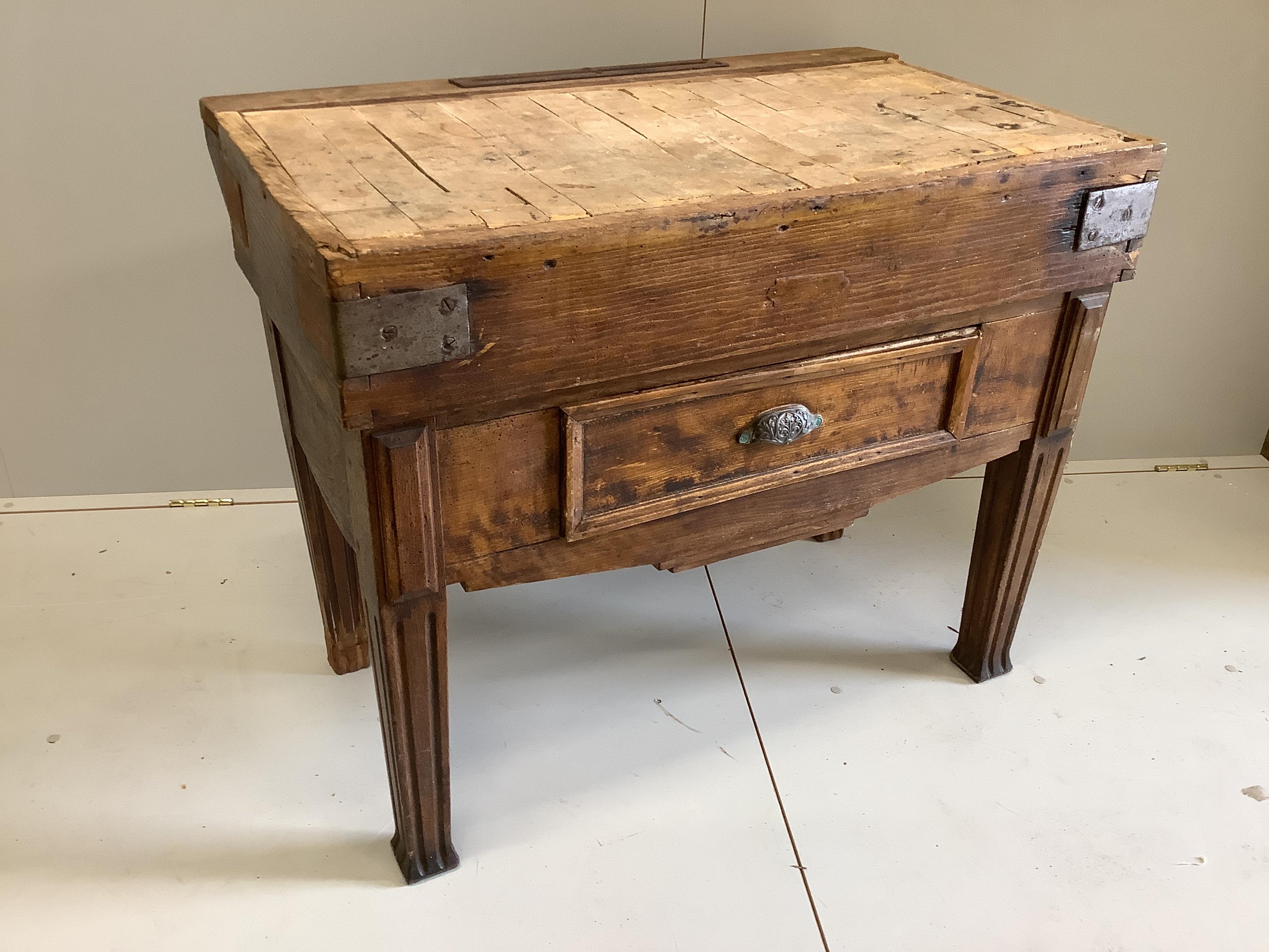 A 19th century French pine and fruitwood butchers block, (evidence of worm, may need treating) width 100cm, depth 60cm, height 80cm